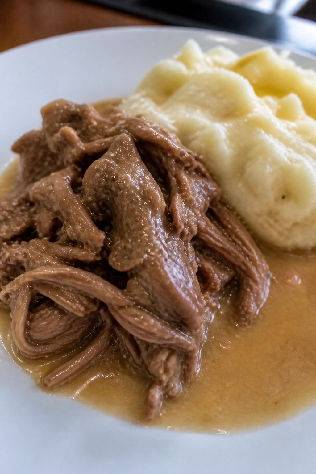 Slow-Cooked Pork Shoulder with Apple Cider Gravy and Mashed Potatoes