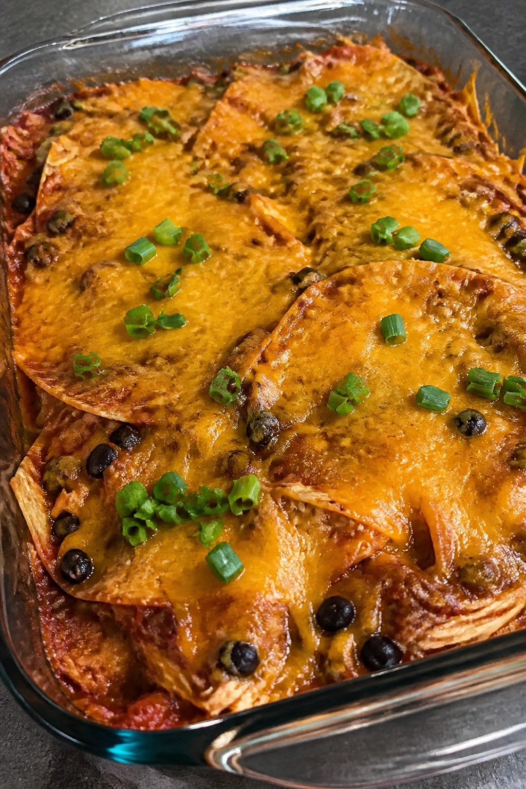 Chicken Enchilada Casserole with Black Beans and Melted Cheese