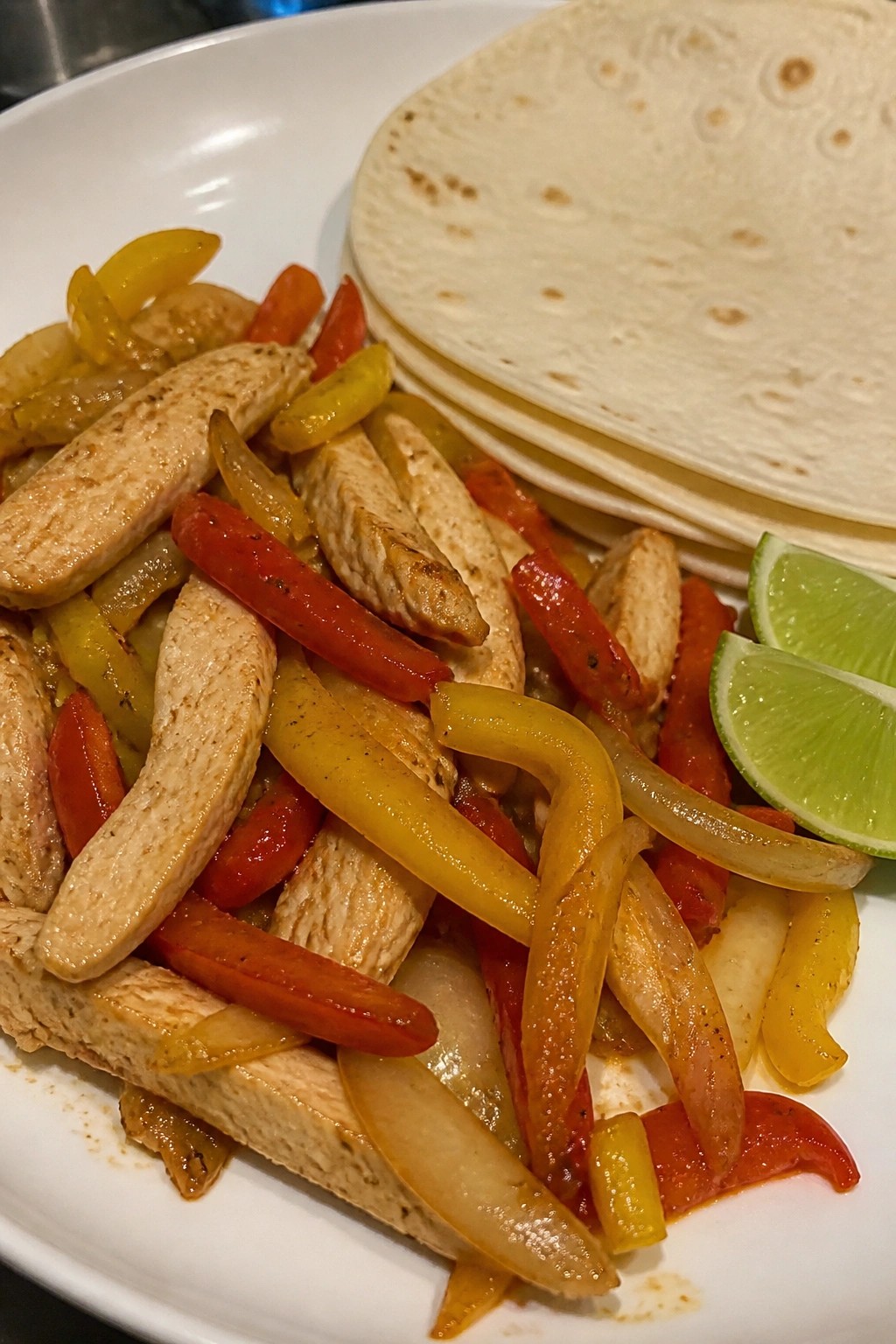 Skillet Chicken Fajitas with Peppers, Onions, and Warm Tortillas