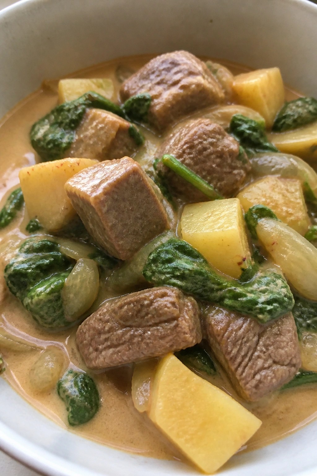 Coconut Curry Beef Stew with Spinach and Potatoes
