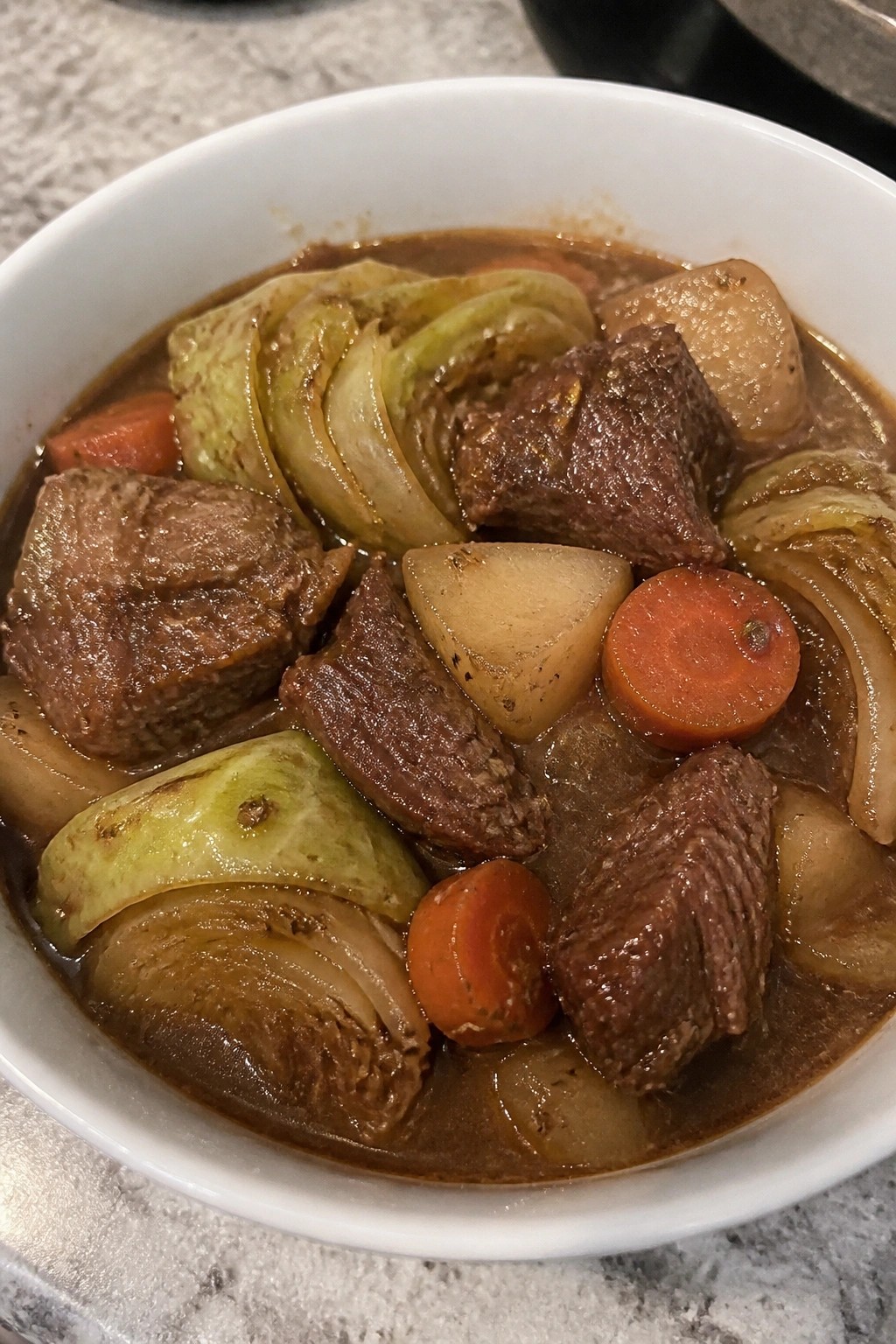 Guinness Beef Stew with Cabbage Wedges and Caraway