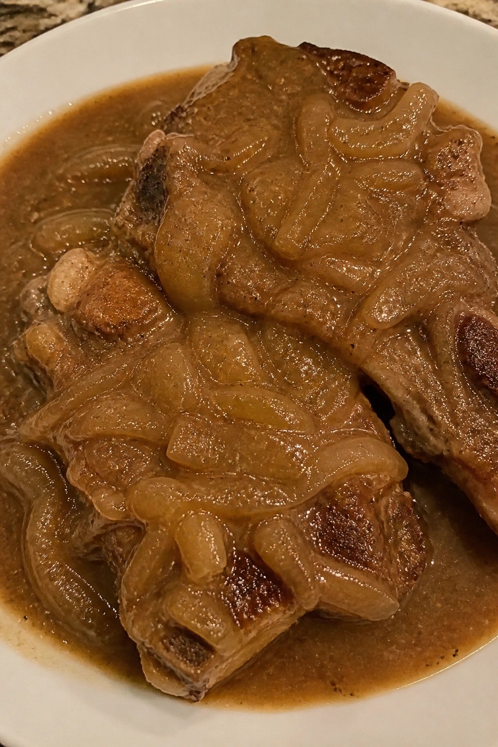 Pork Chops Smothered in Caramelized Onion Gravy