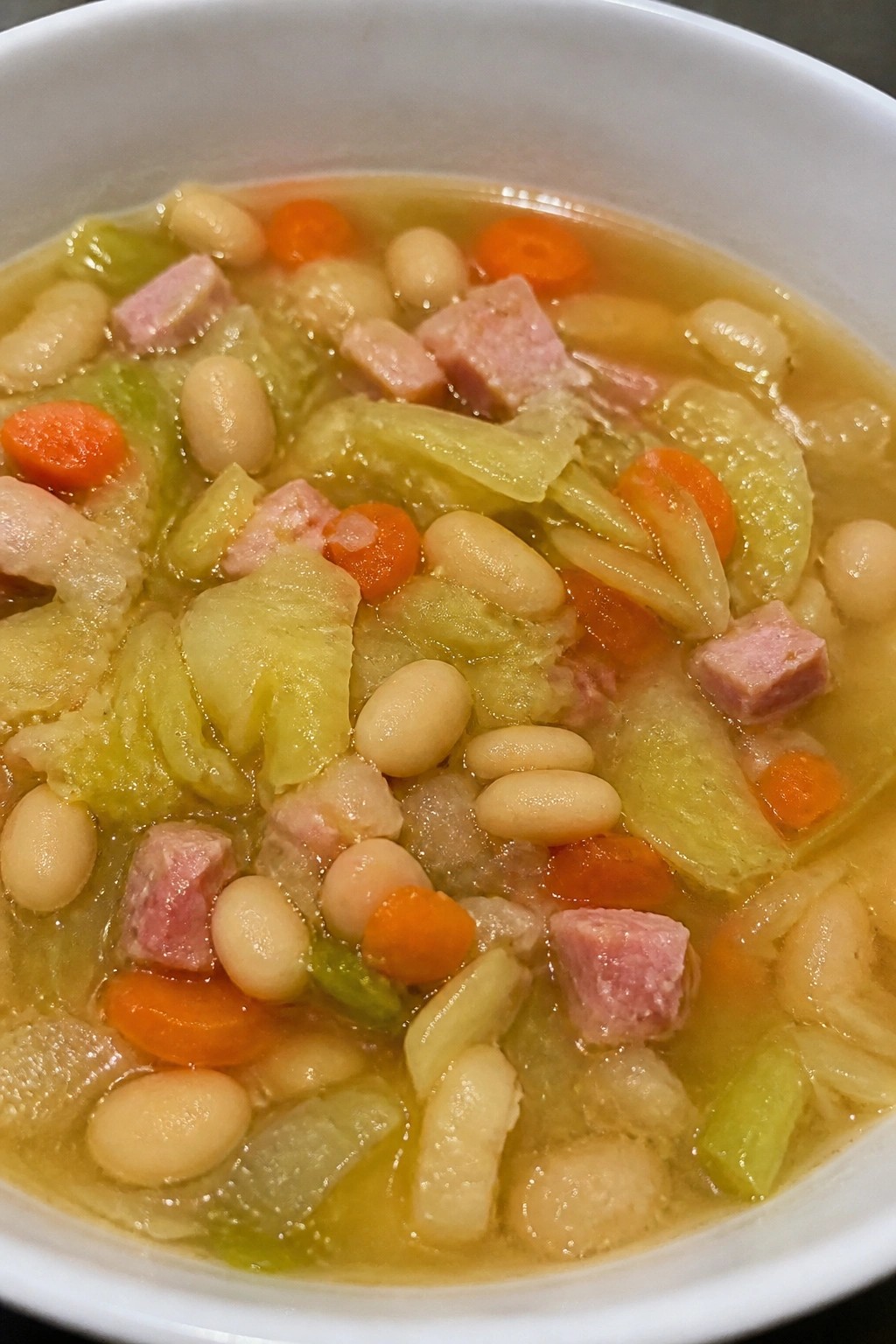 Cabbage and White Bean Ham Soup with Onions and Carrots