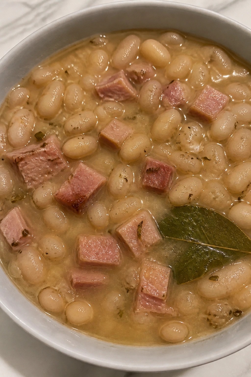 Garlicky White Bean and Ham Soup with Thyme and Bay Leaves