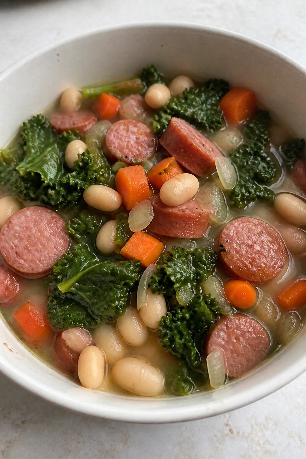 Smoky Sausage Kale and White Bean Stew