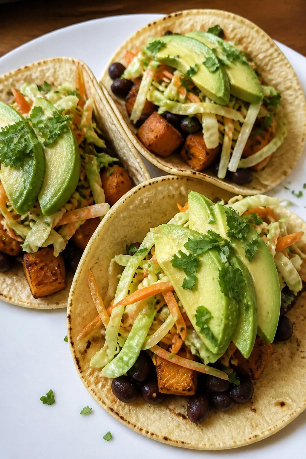 Sweet Potato and Black Bean Tacos with Cabbage Slaw and Avocado
