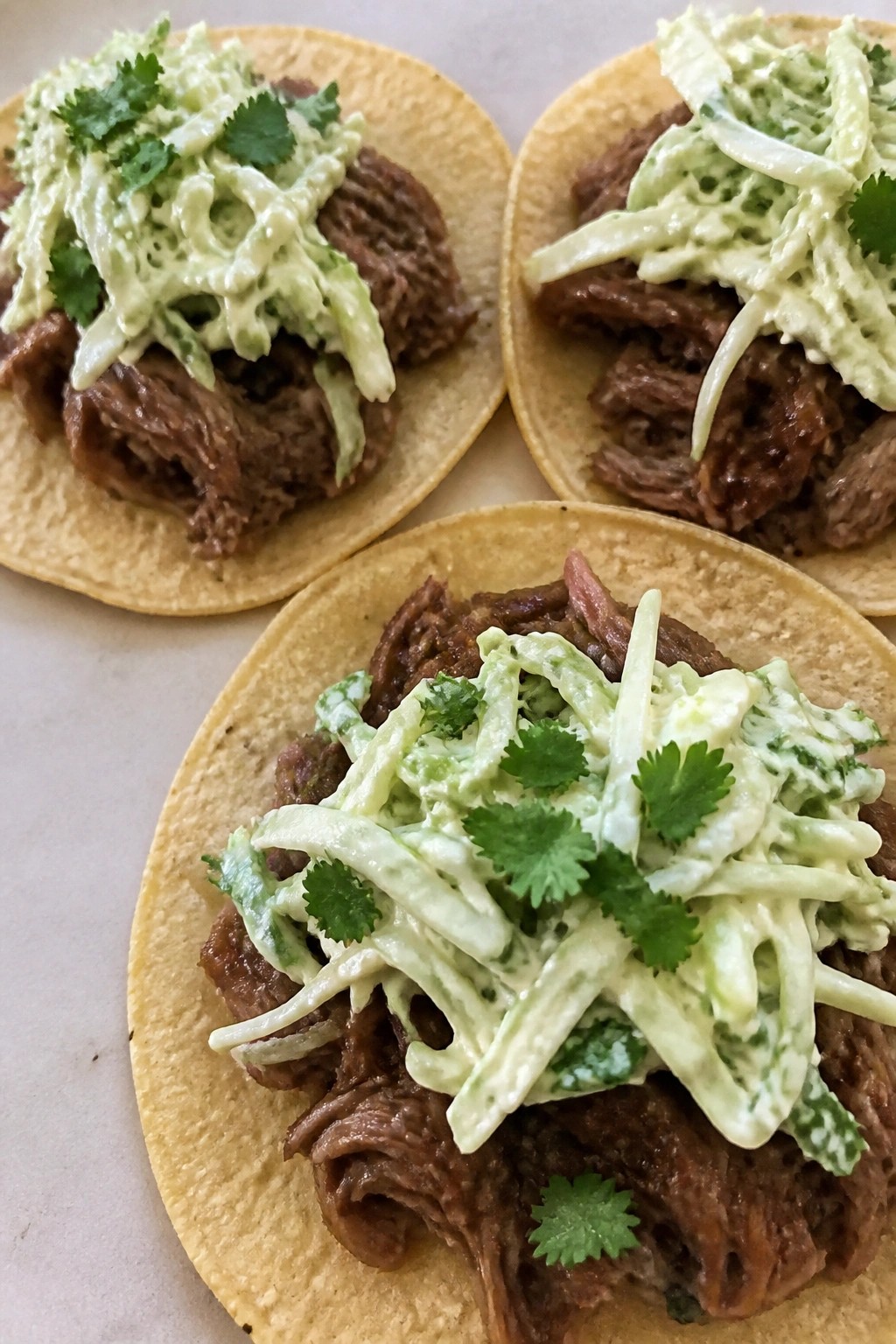 Slow Cooker Beef Barbacoa Tacos with Cilantro Lime Slaw