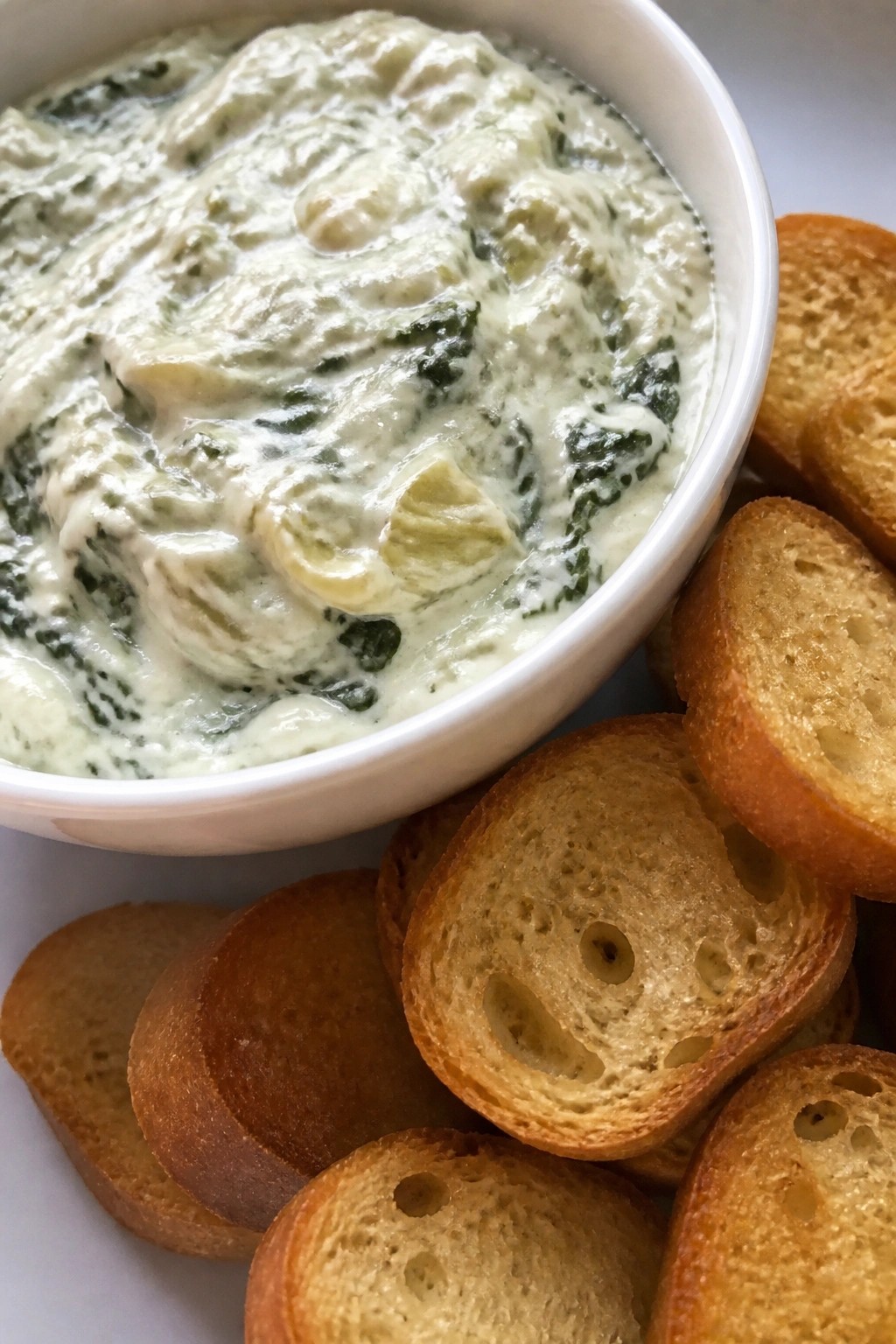 Creamy Spinach Artichoke Dip with Crostini