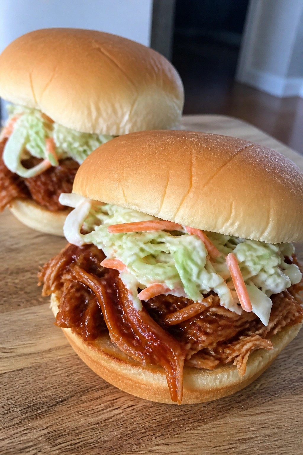 Slow Cooker Pulled Pork Sandwiches with Tangy Slaw