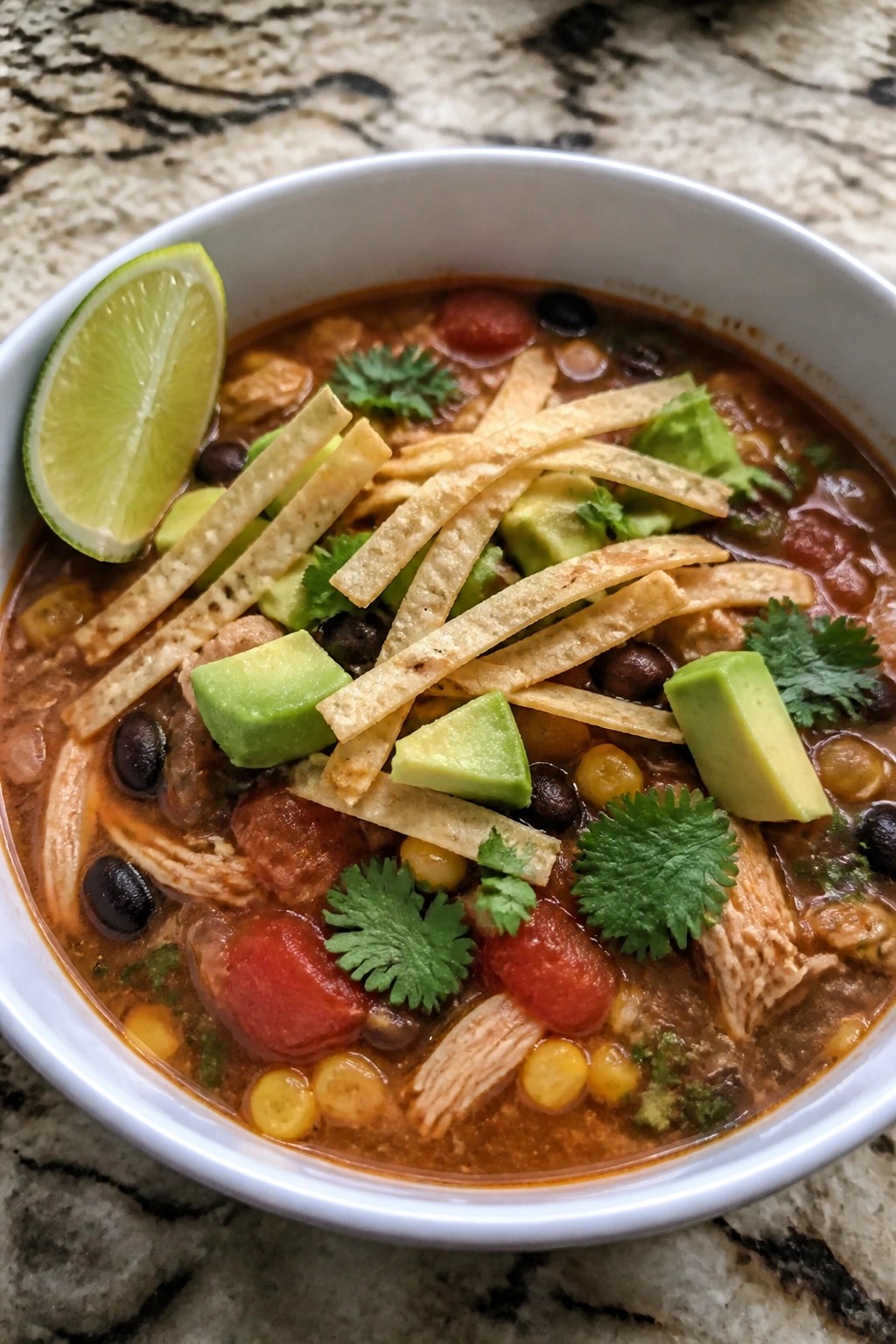 Hearty Crockpot Chicken Tortilla Soup with Avocado
