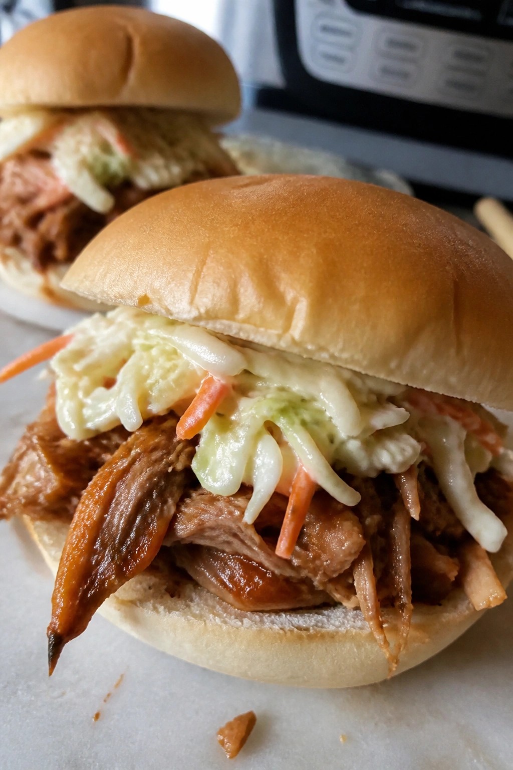 Slow Cooker Pulled Pork Sandwiches with Tangy Coleslaw