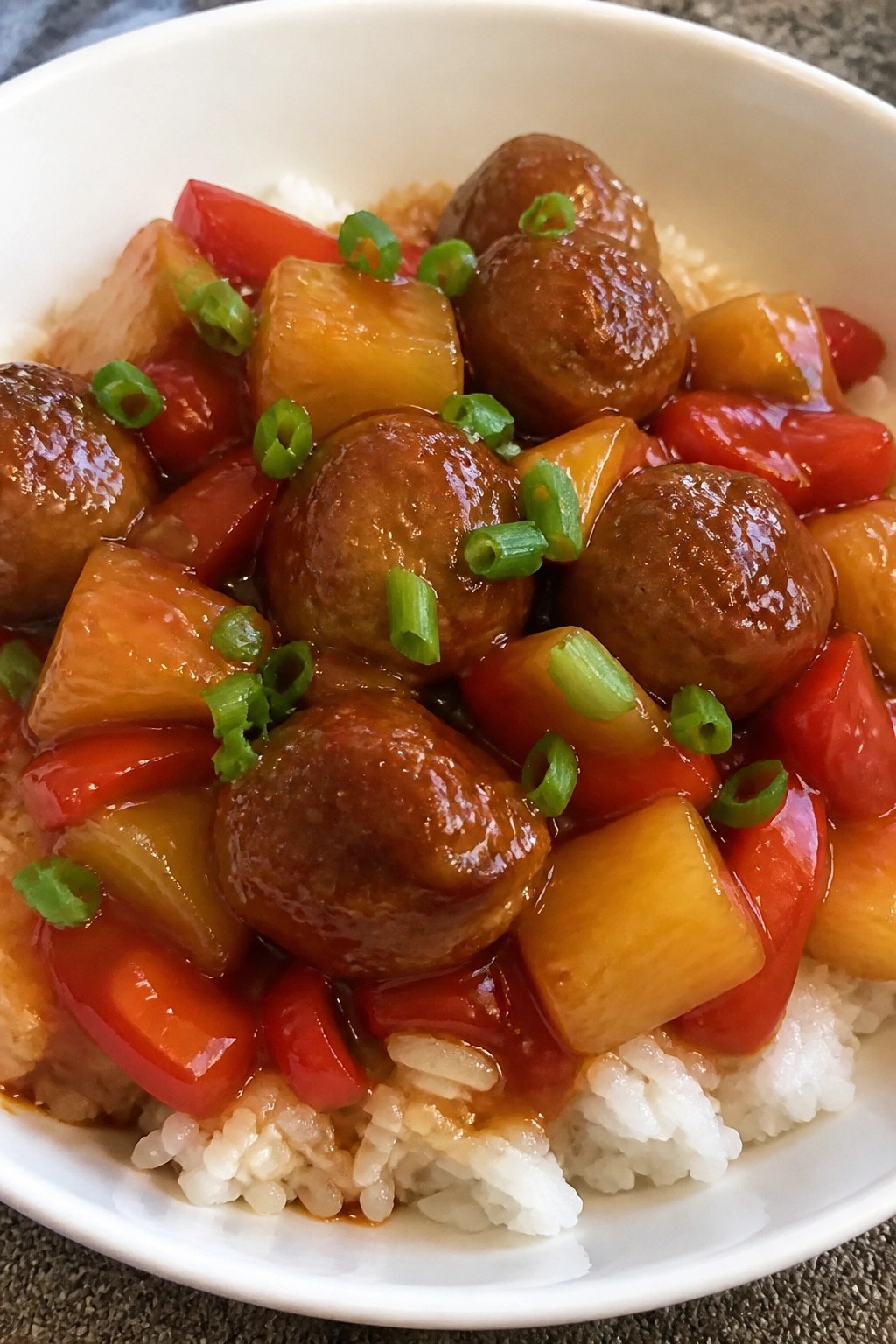 Sweet and Sour Crockpot Meatballs over Rice