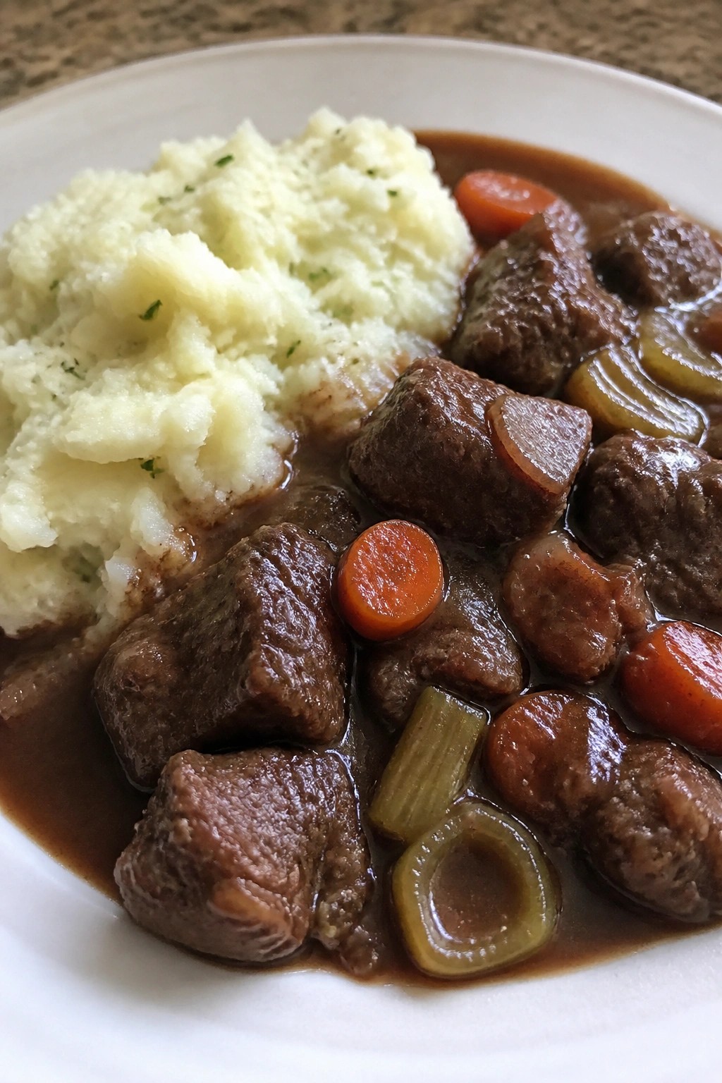 Hearty Beef and Guinness Stew with Garlic Mashed Potatoes
