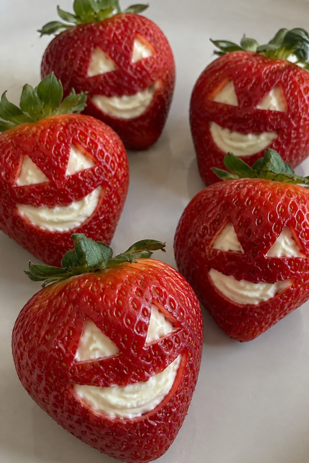 Jack-O'-Lantern Stuffed Strawberries