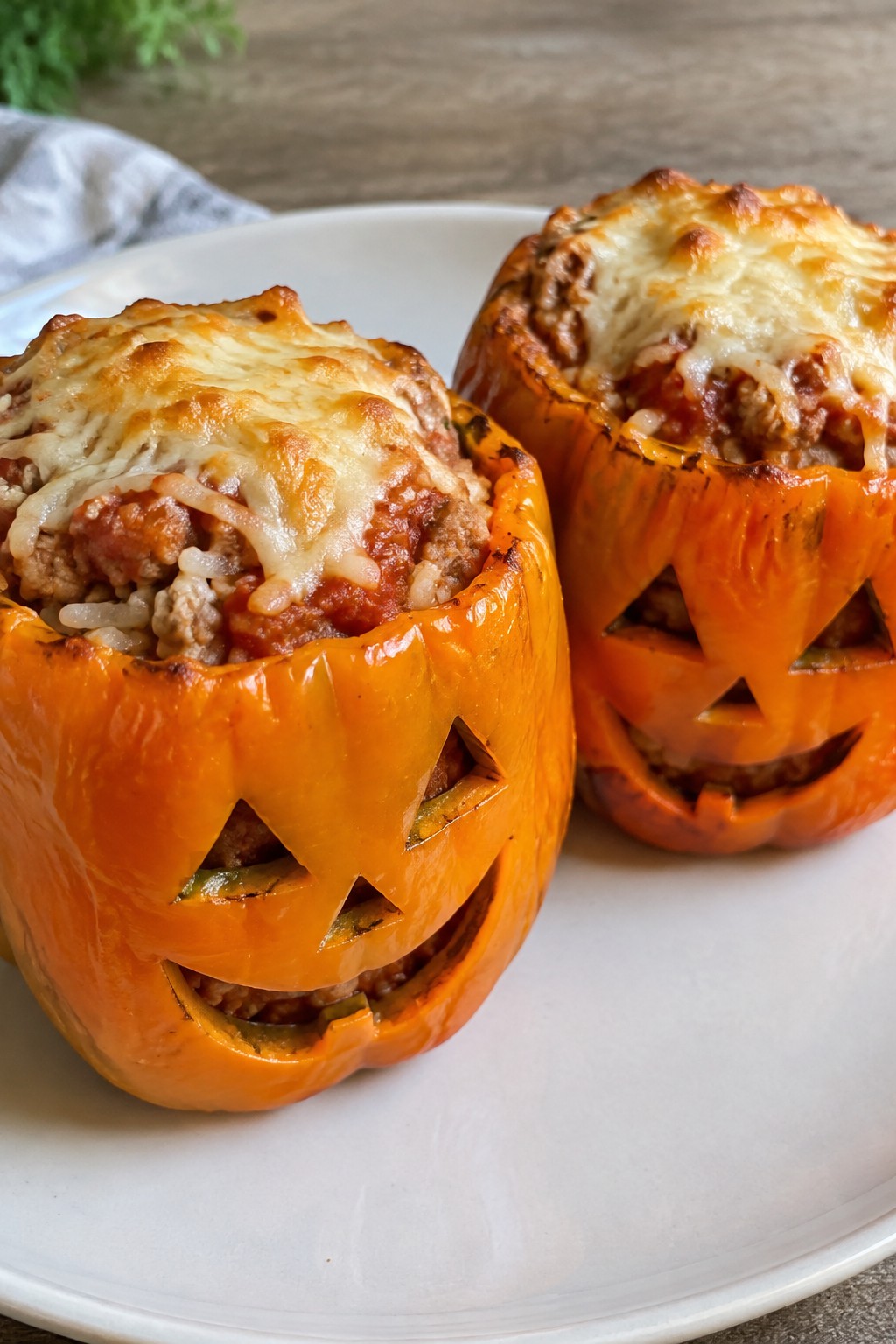 Jack-o'-Lantern Stuffed Peppers with Turkey and Rice