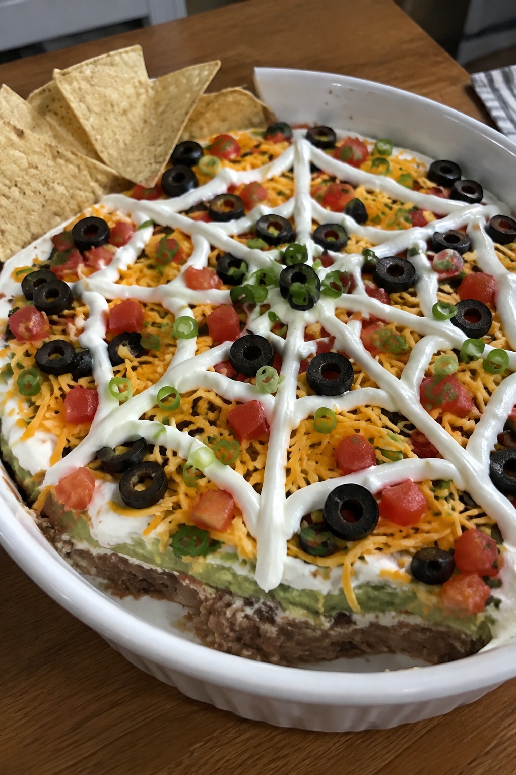 Seven-Layer Spiderweb Dip with Tortilla Chips