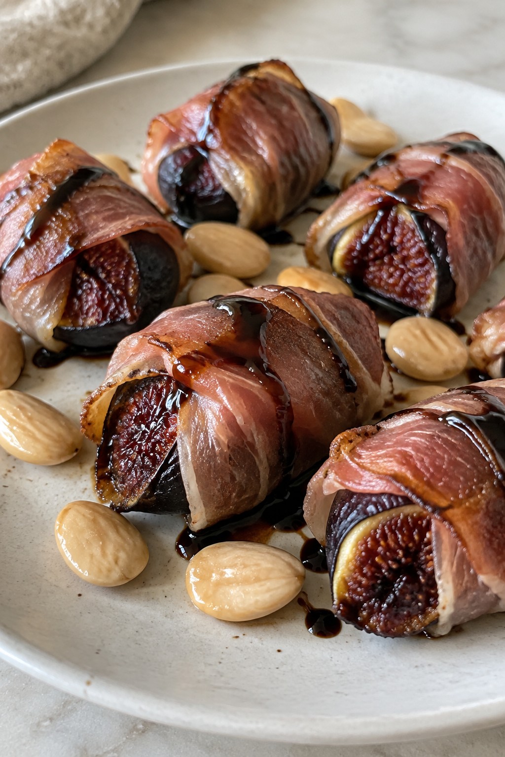 Prosciutto-Wrapped Black Mission Figs with Aged Balsamic and Marcona Almonds