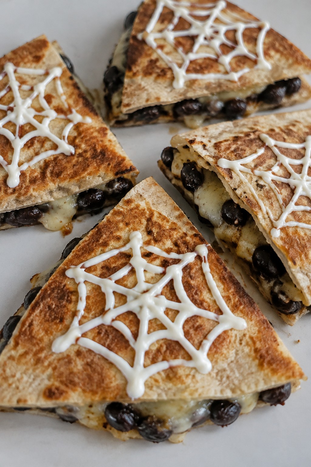 Spiderweb Black Bean Quesadilla Triangles