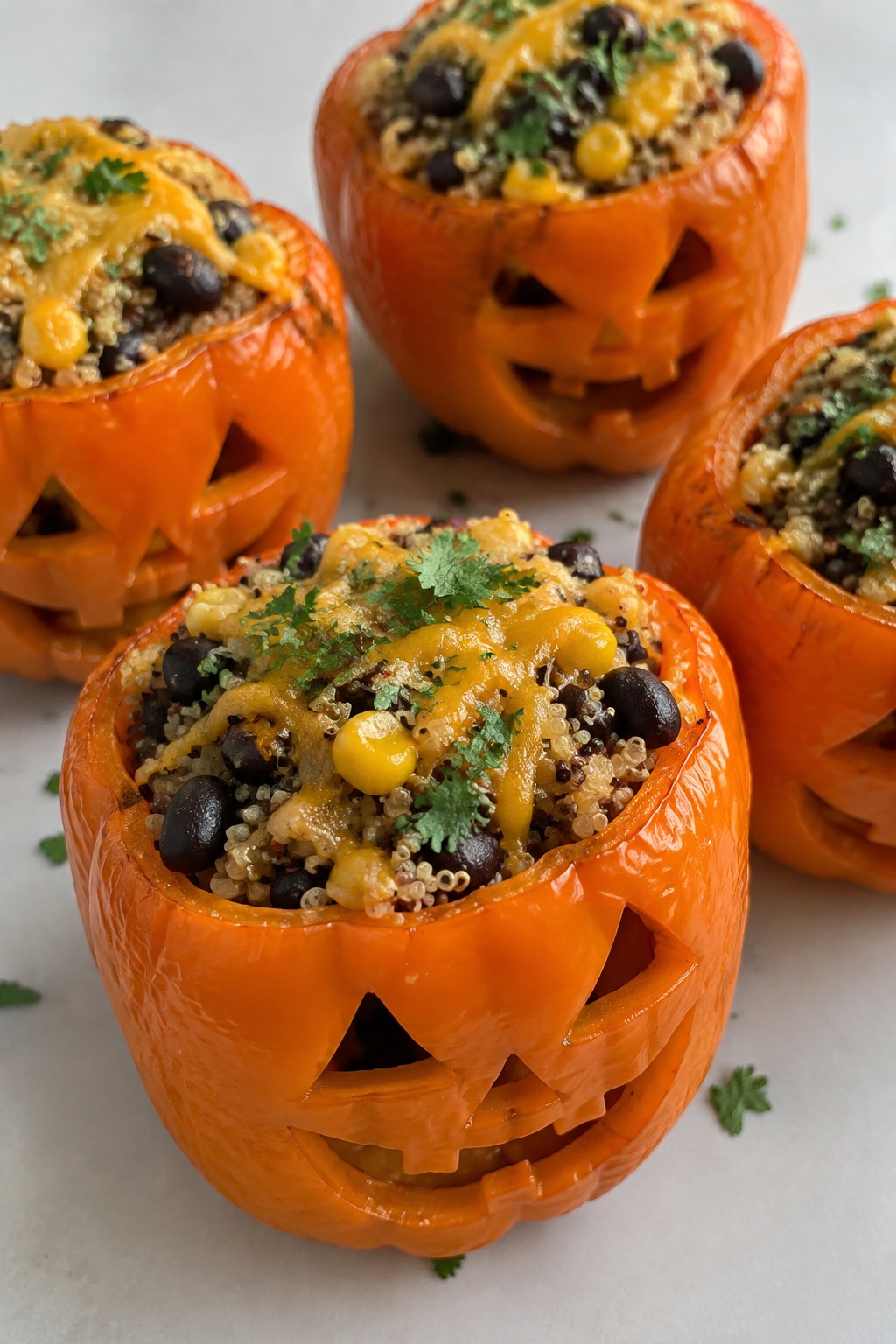 Jack-o'-Lantern Quinoa Stuffed Peppers