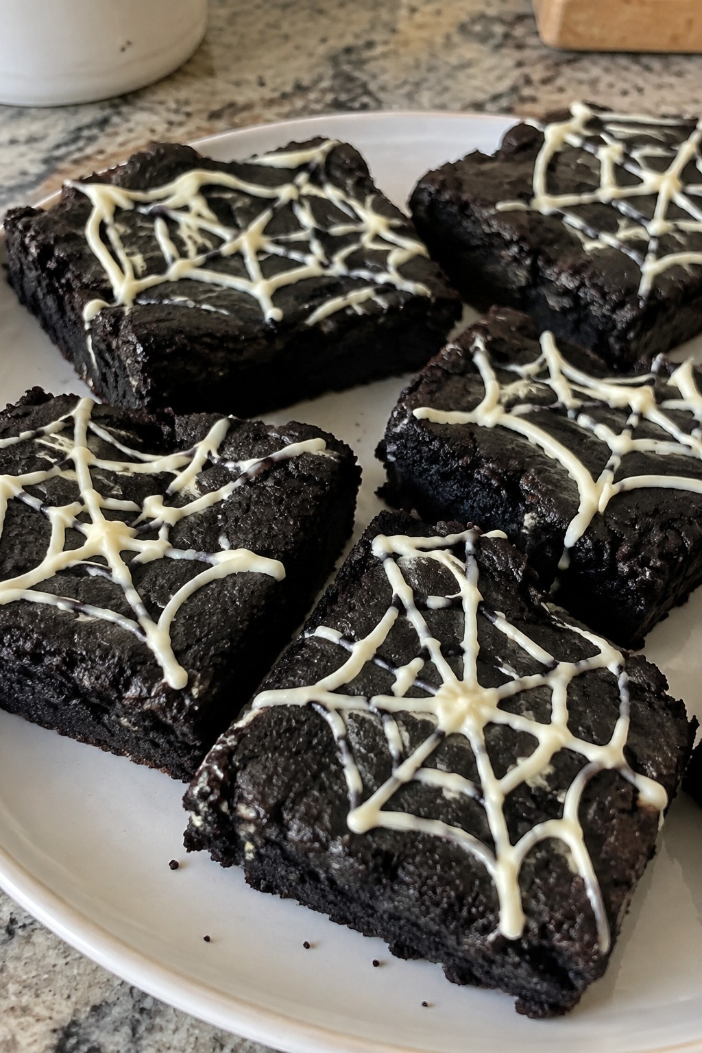 Black Cocoa Spiderweb Brownies