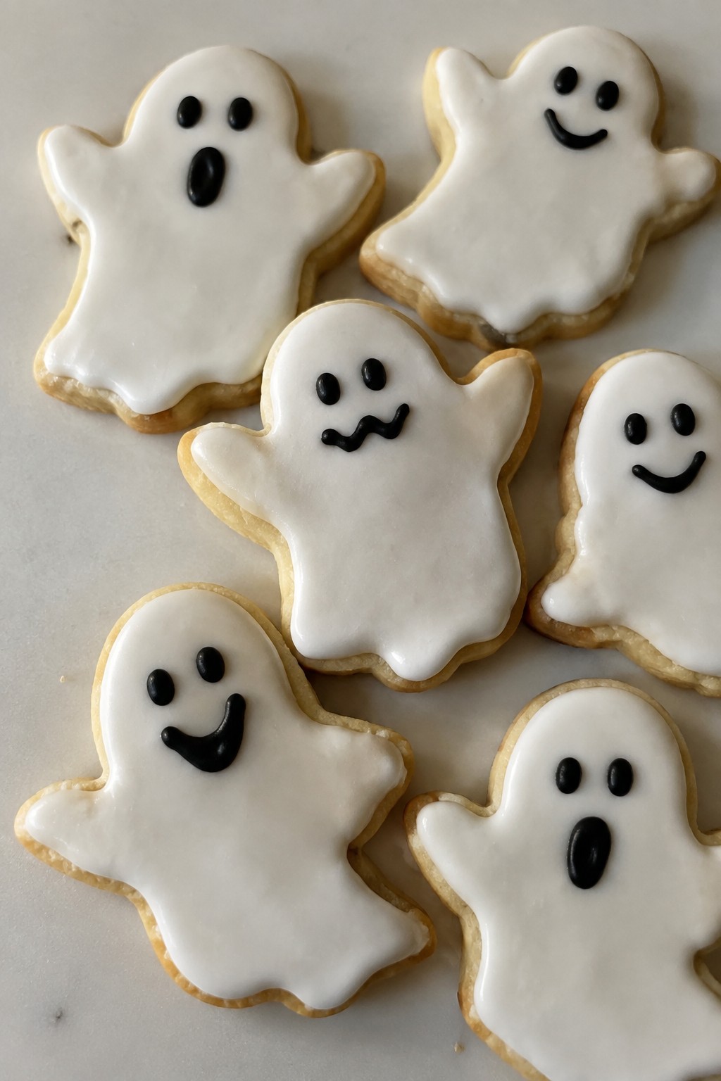 Ghostly Vanilla Sugar Cookies with Royal Icing Faces