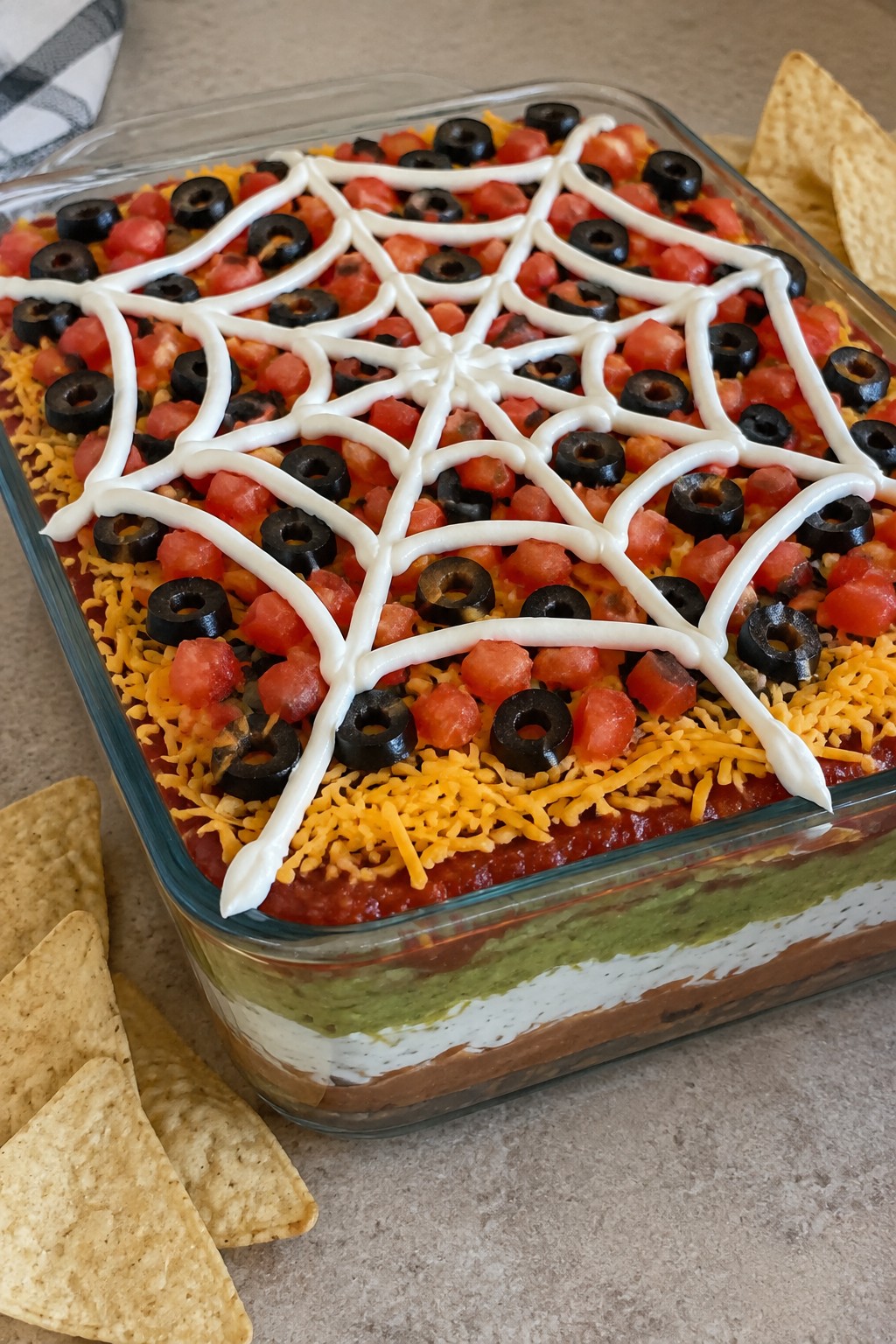 Spiderweb Seven-Layer Taco Dip with Tortilla Chips