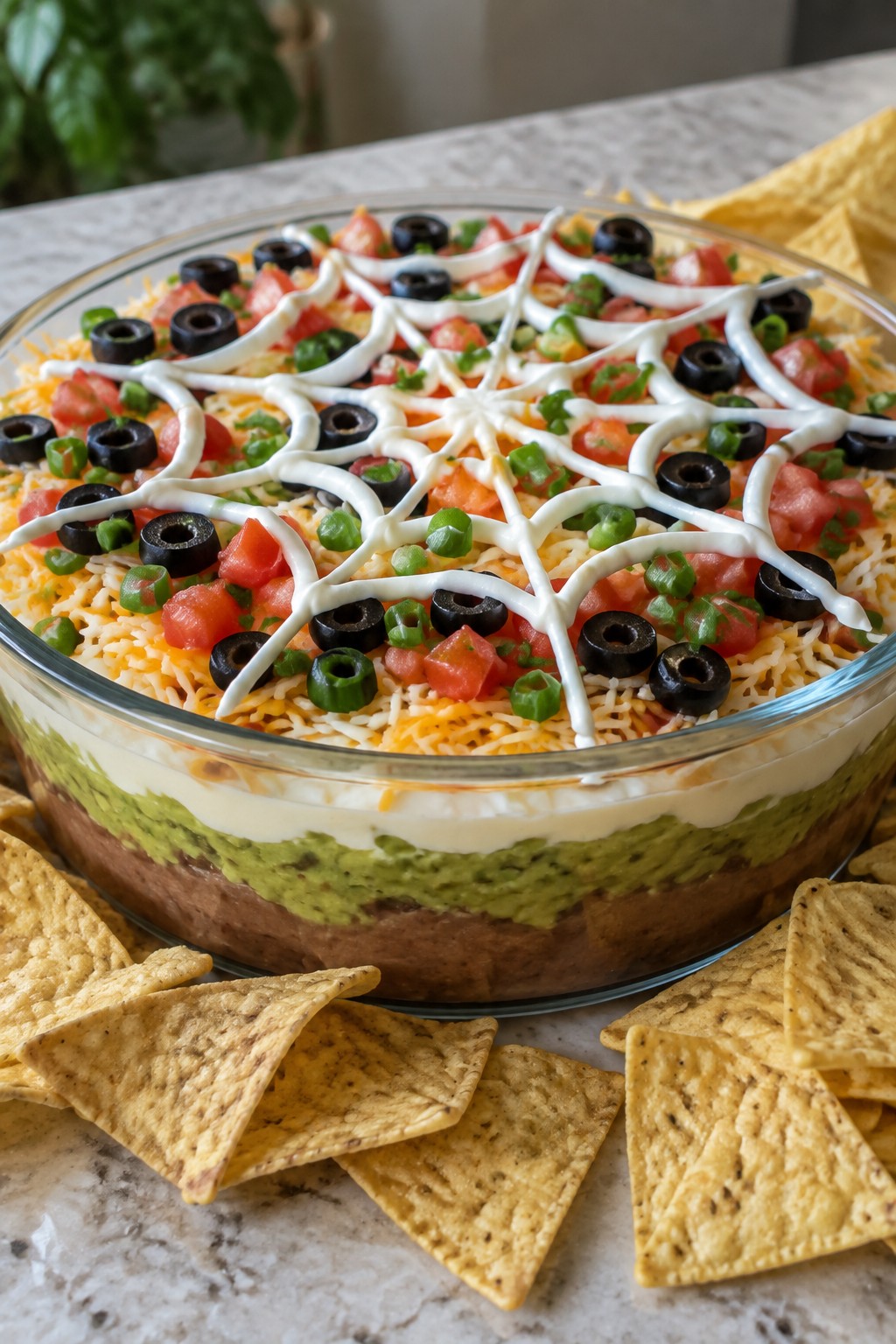 Spiderweb Seven Layer Dip with Tortilla Chips