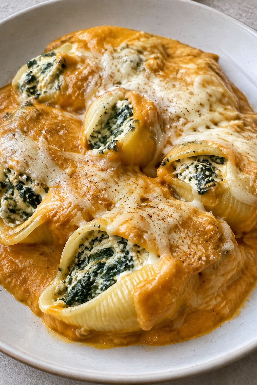 Spinach and Ricotta Stuffed Shells with Pumpkin Cream Sauce