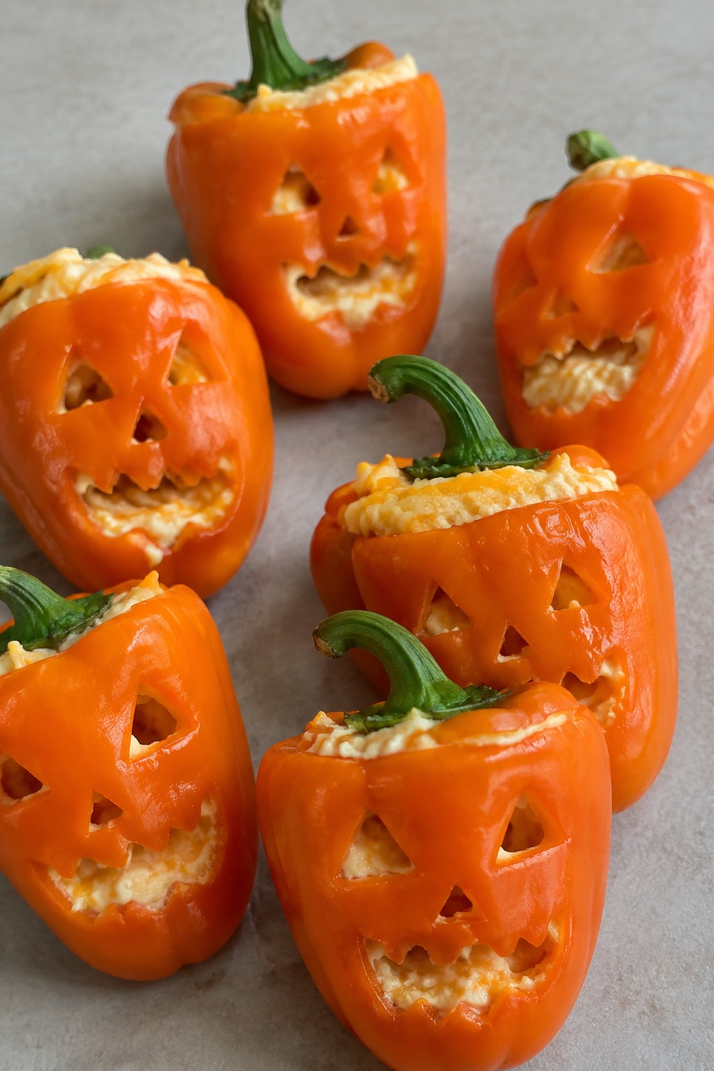 Jack-o'-Lantern Stuffed Mini Peppers