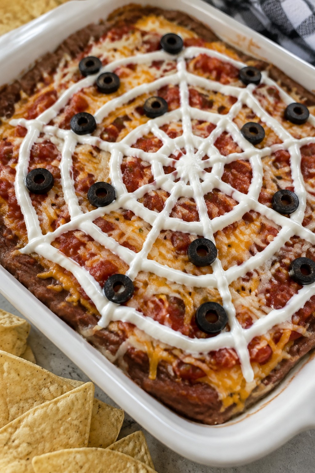 Spiderweb Layered Taco Dip with Tortilla Chips