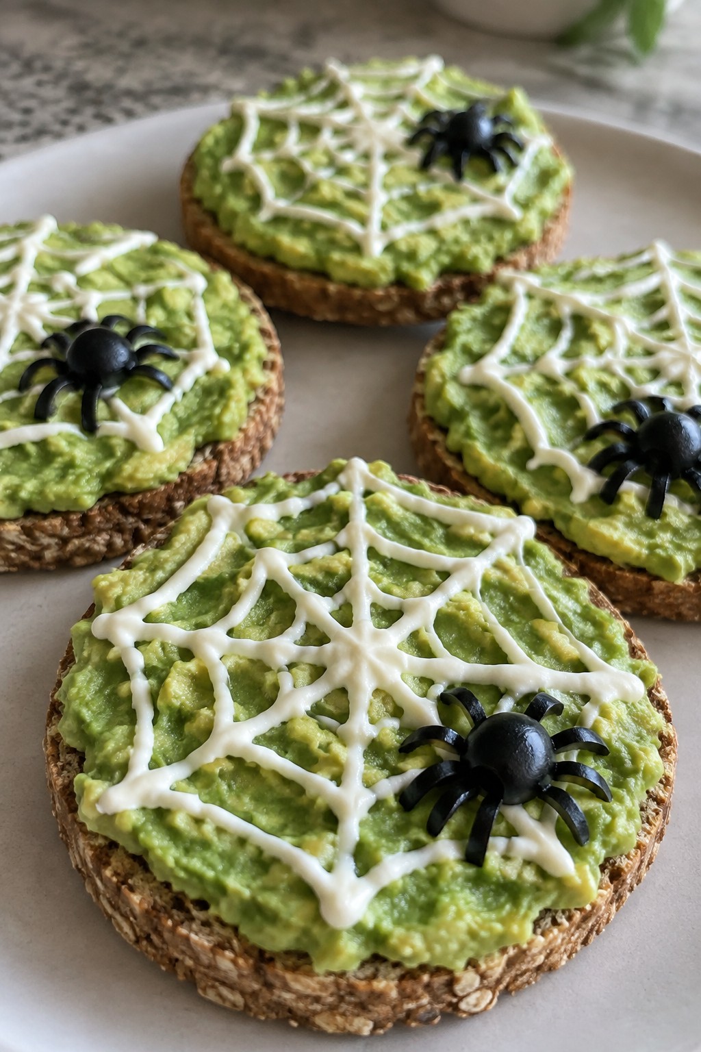 Avocado Spiderweb Toast Rounds