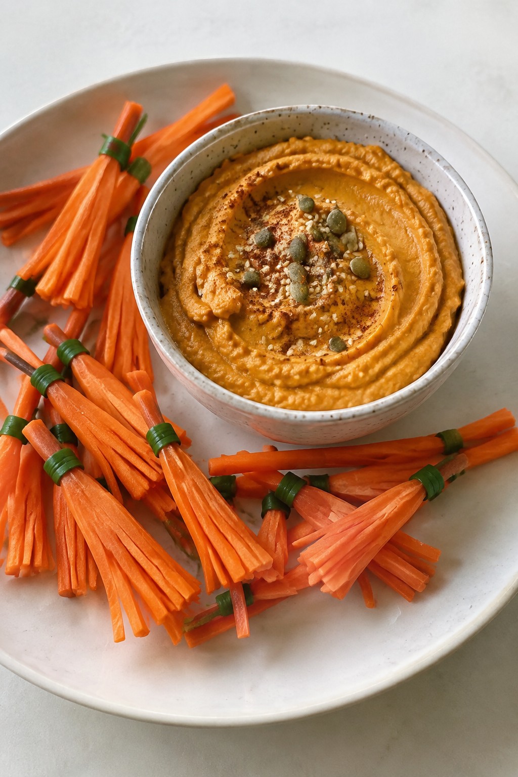 Pumpkin Hummus with Carrot Broomstick Dippers