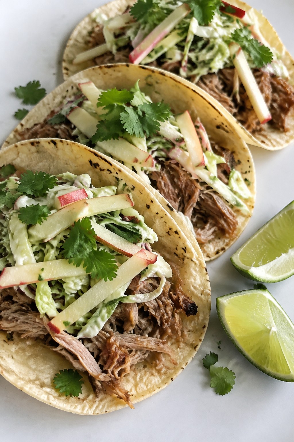 Slow Cooker Smoky Apple Cider Pulled Pork Tacos with Cabbage Slaw