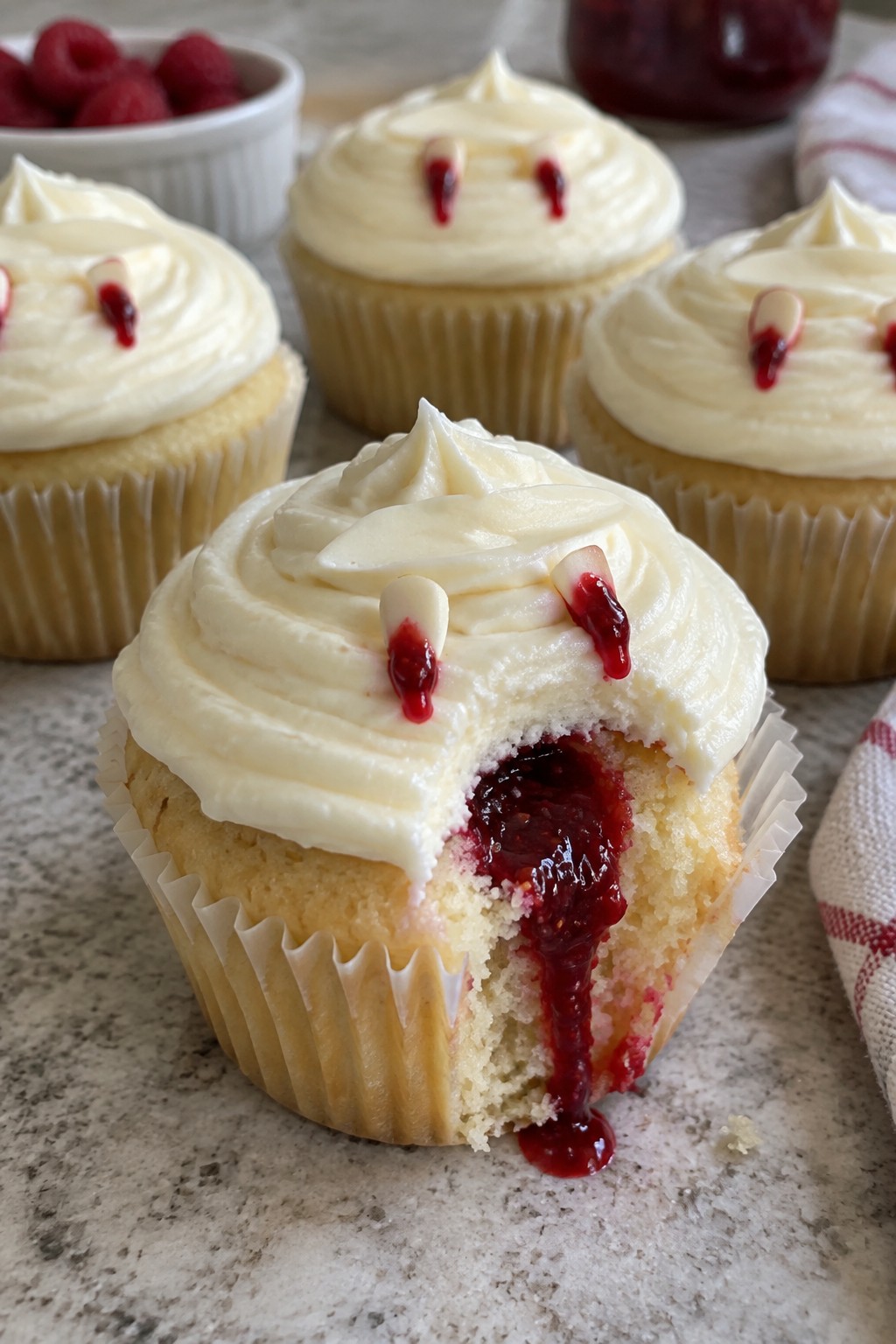 Vampire Bite Raspberry-Filled Cupcakes