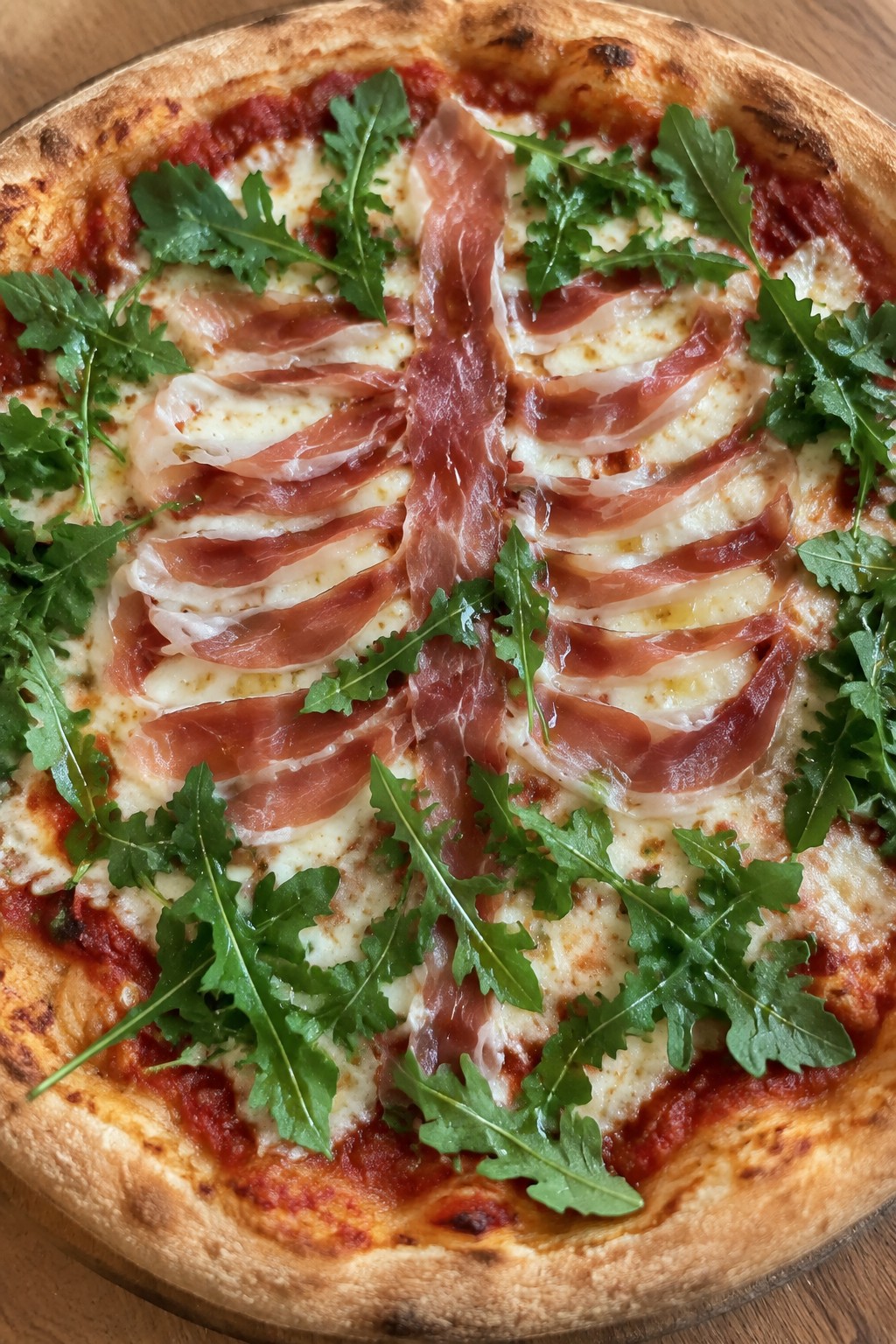 Skeleton Prosciutto and Arugula Pizza