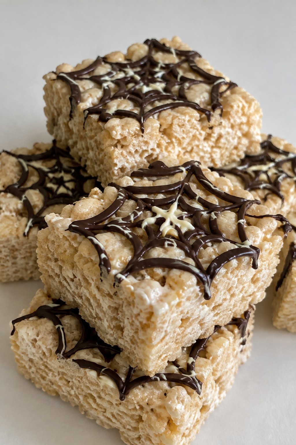 Spiderweb Drizzle Rice Krispie Treat Squares