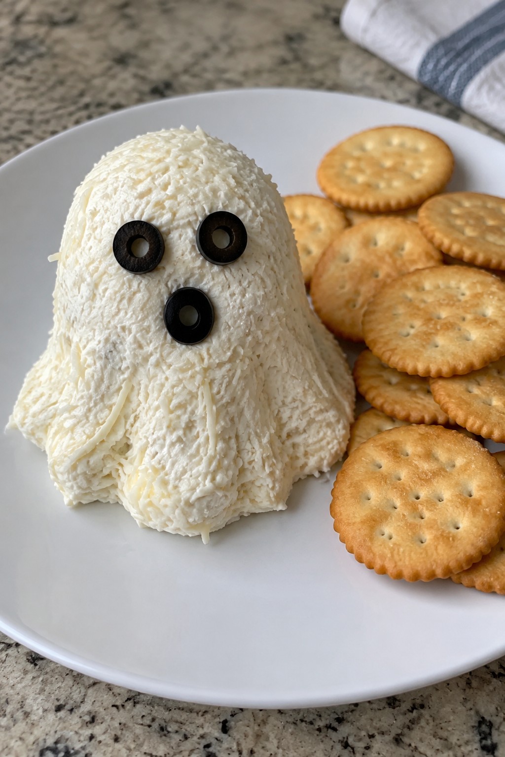 Ghostly Cheese Ball with Crackers