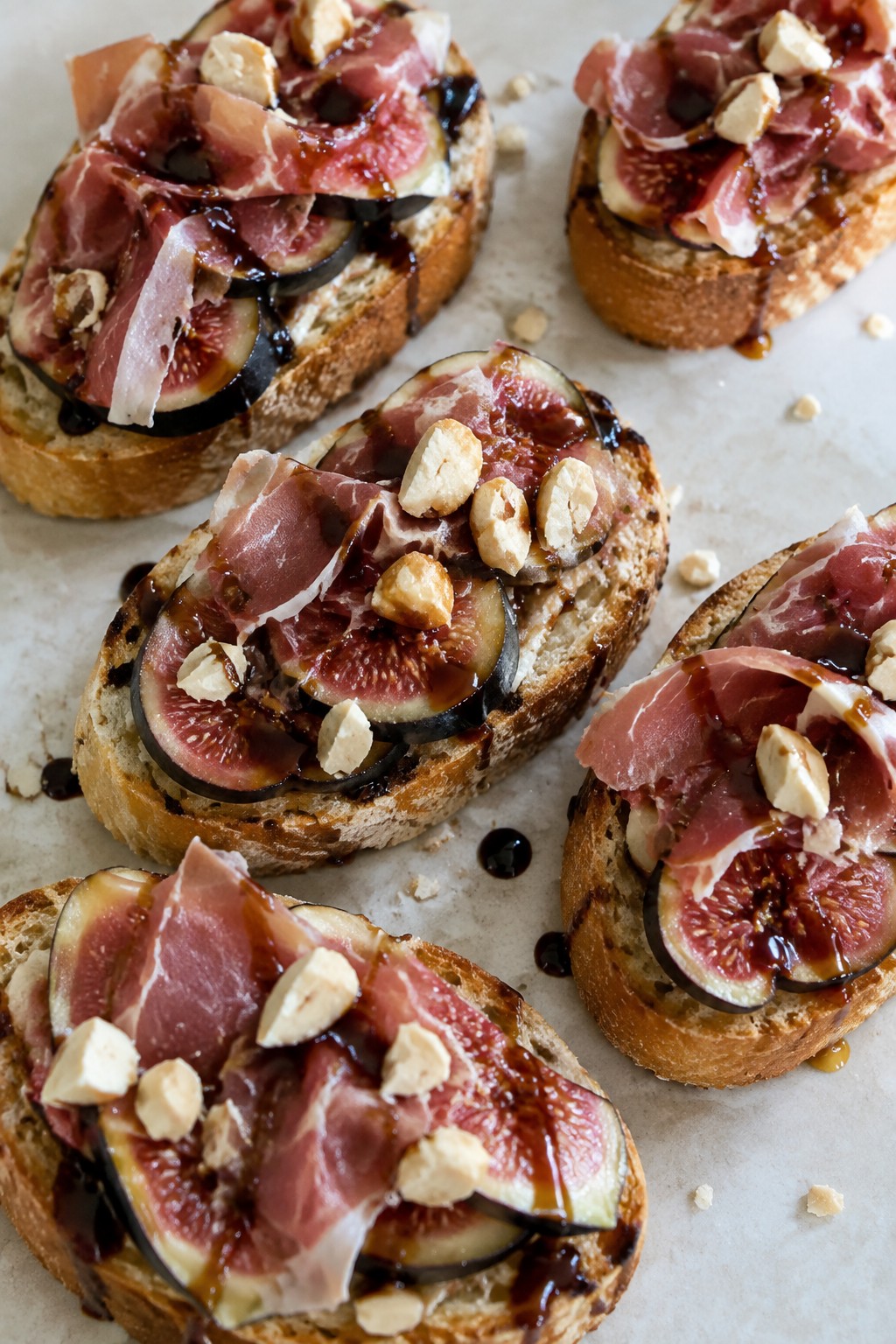 Fig and Prosciutto Crostini with Balsamic and Marcona Almonds