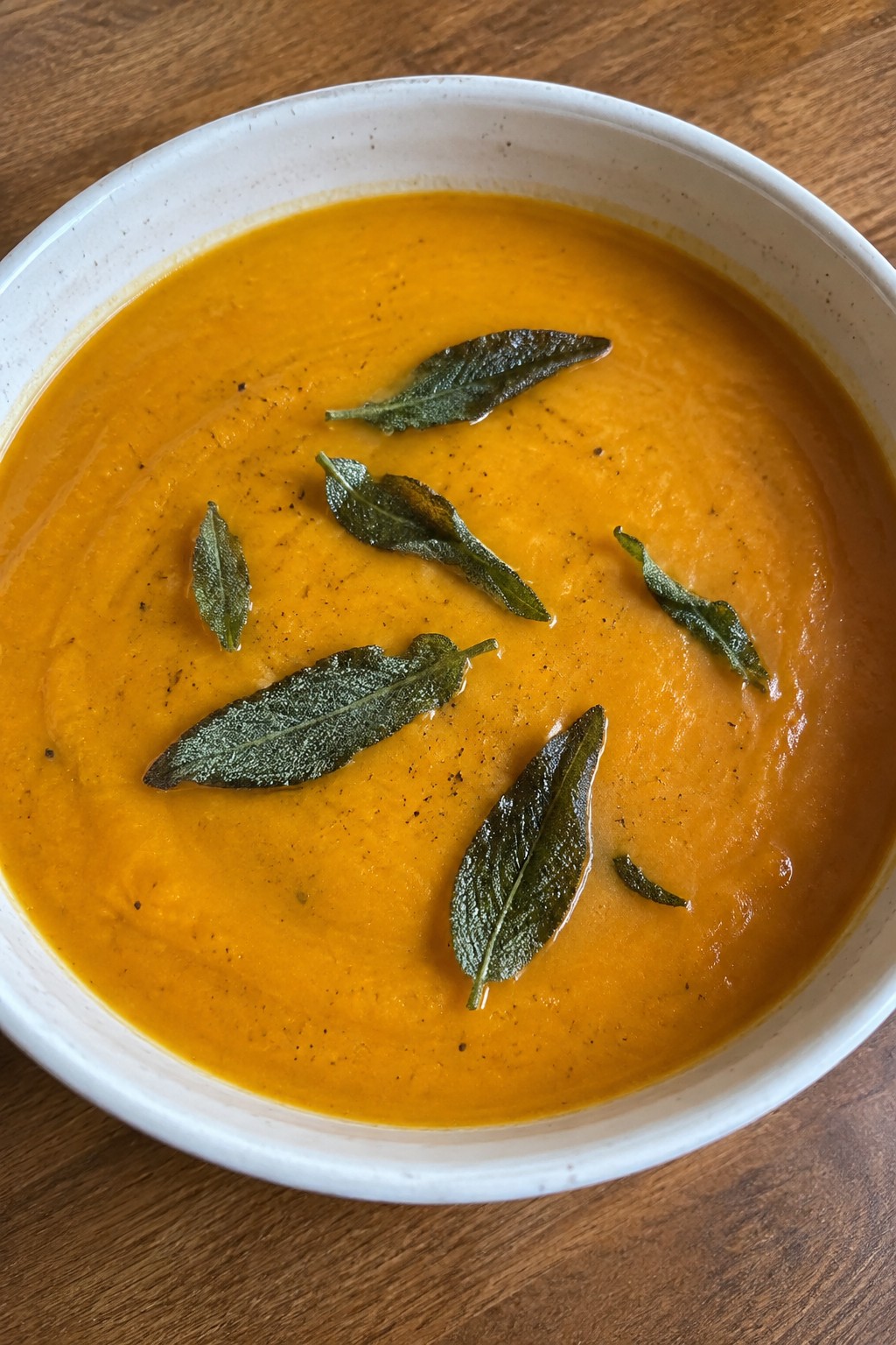 Creamy Pumpkin Soup with Crispy Sage Topping