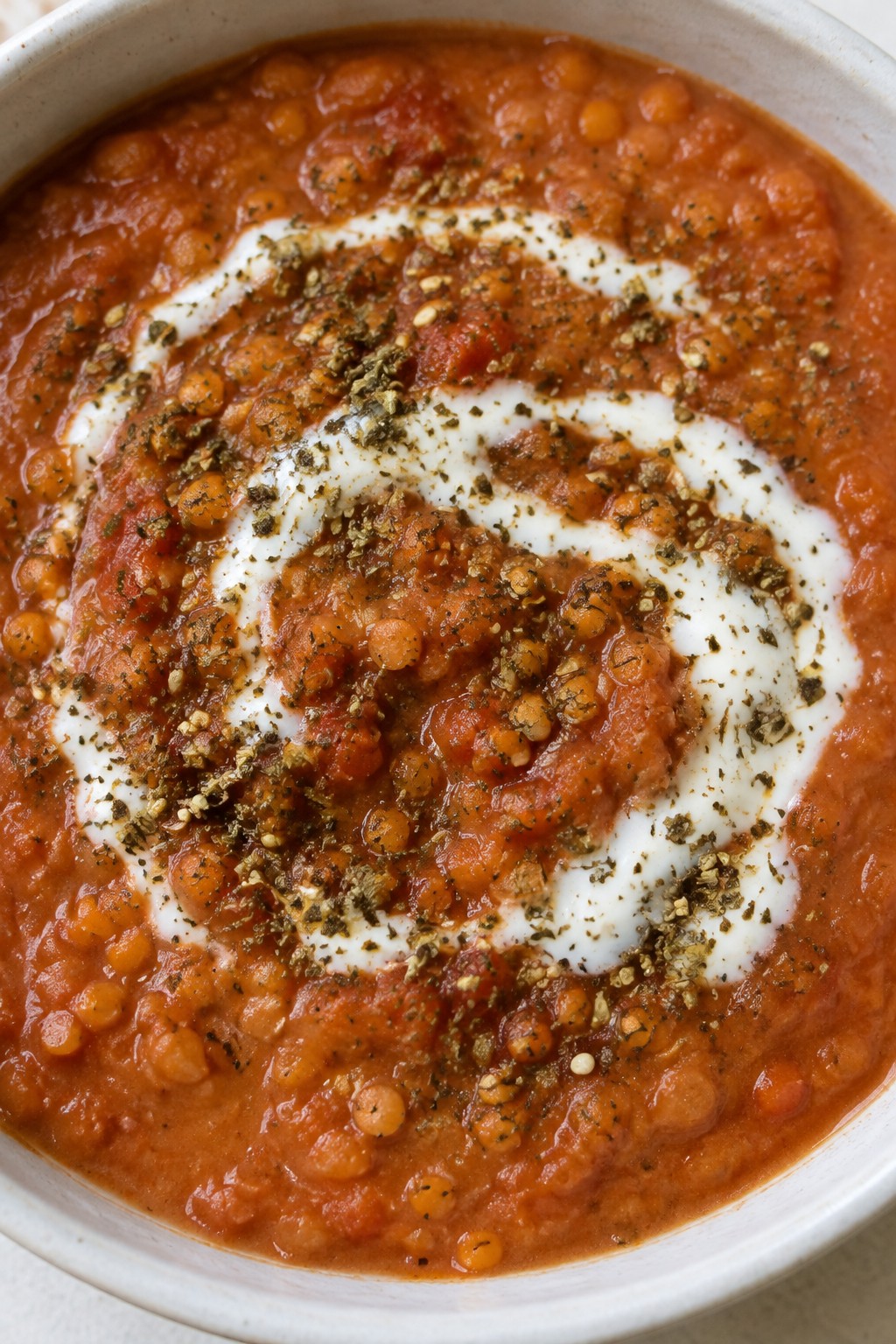 Creamy Tomato Lentil Stew Topped with Yogurt and Za’atar